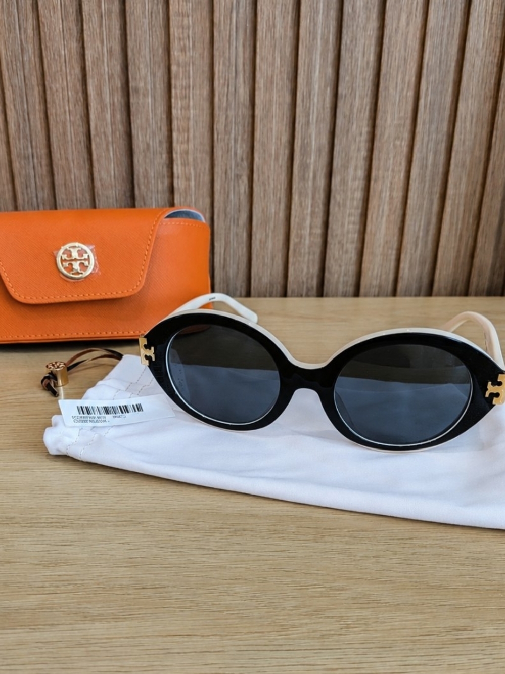 Tory Burch Black Round Sunglasses with Orange Case